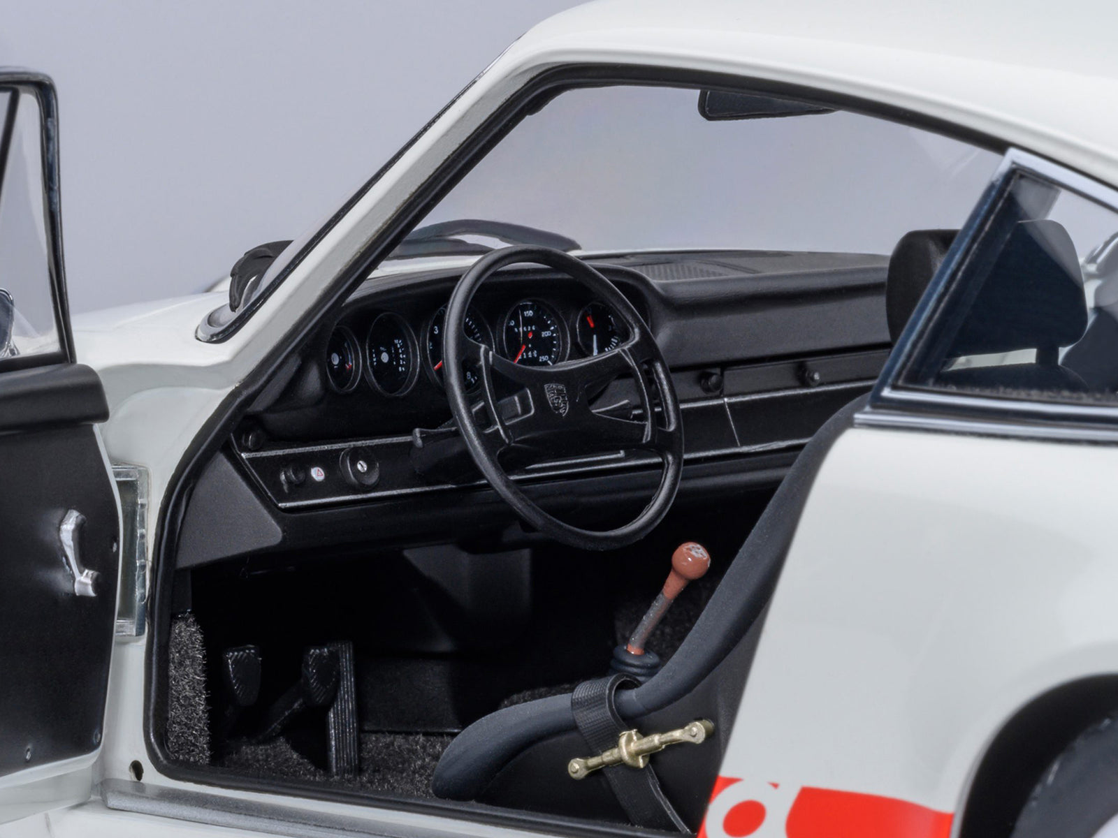 Porsche 911 Carrera 2.7 RS Grand Prix White with Red Stripes and Wheels 1/18 Model Car - Image 4